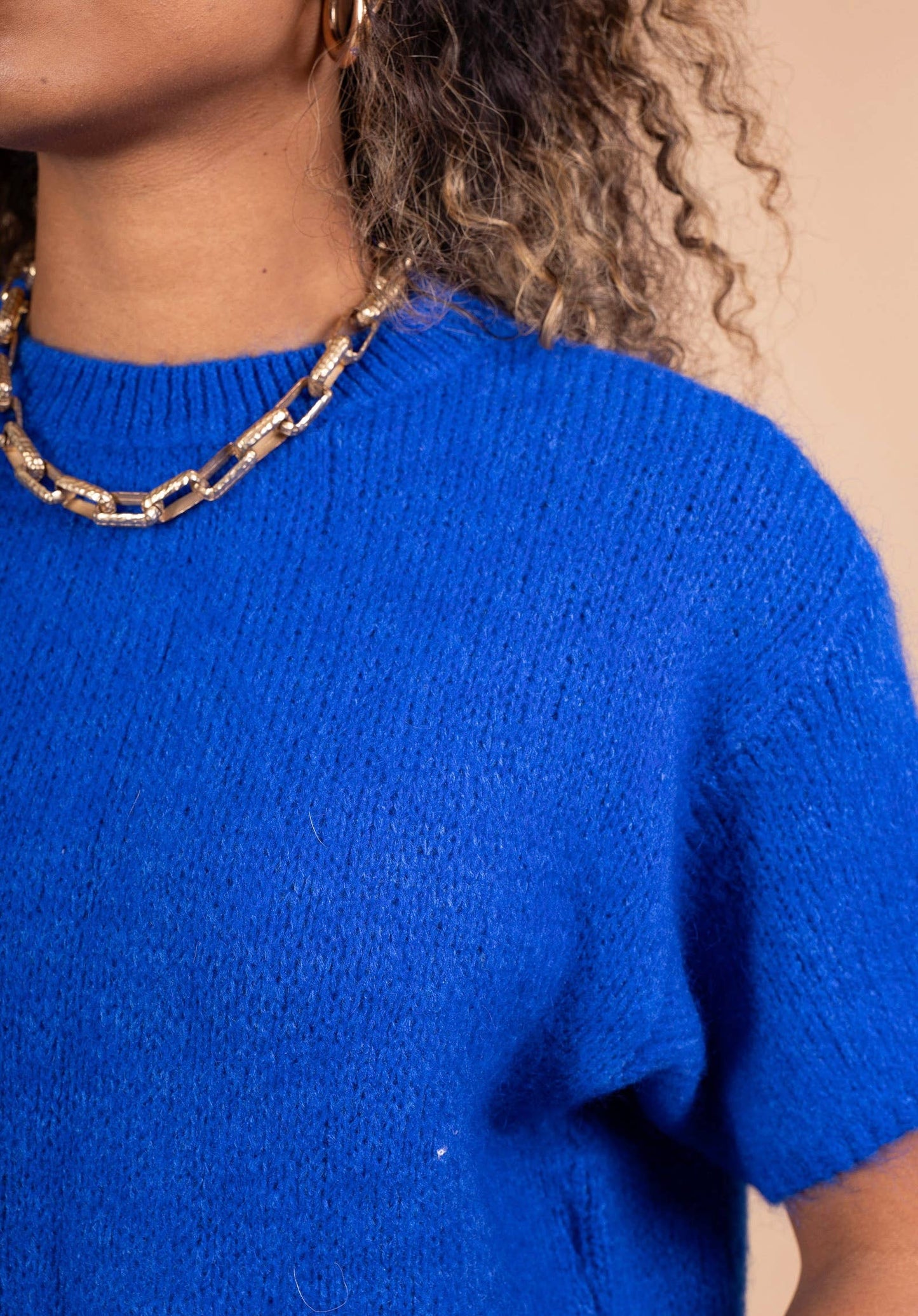 Rost KortÀrmad Stickad